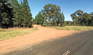 rural-dirt-road-joins-main-road