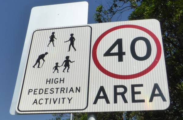 40 limit pedestrian area sign