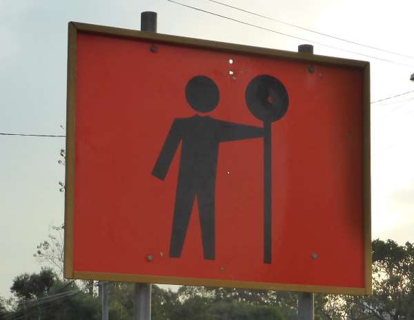 traffic controller ahead sign