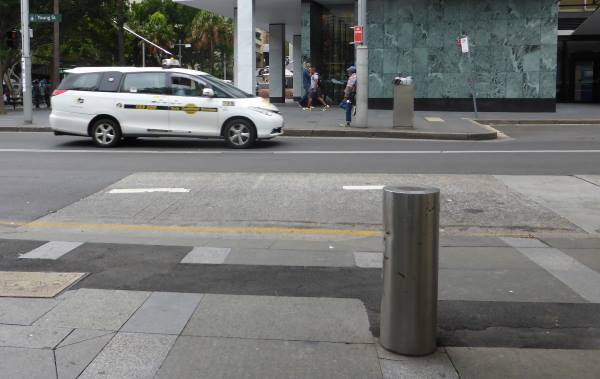 bollard with taxi