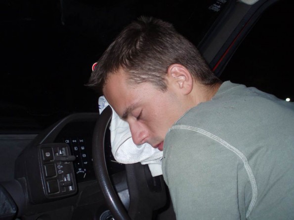 Driver sleeping at rest stop