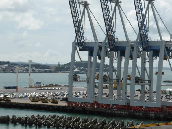 Behind the cranes you'll see vehicle storage at Ports of Auckland at Captain Cook Wharf. 