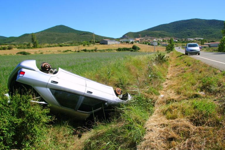 How do rollover accidents happen and what causes them?