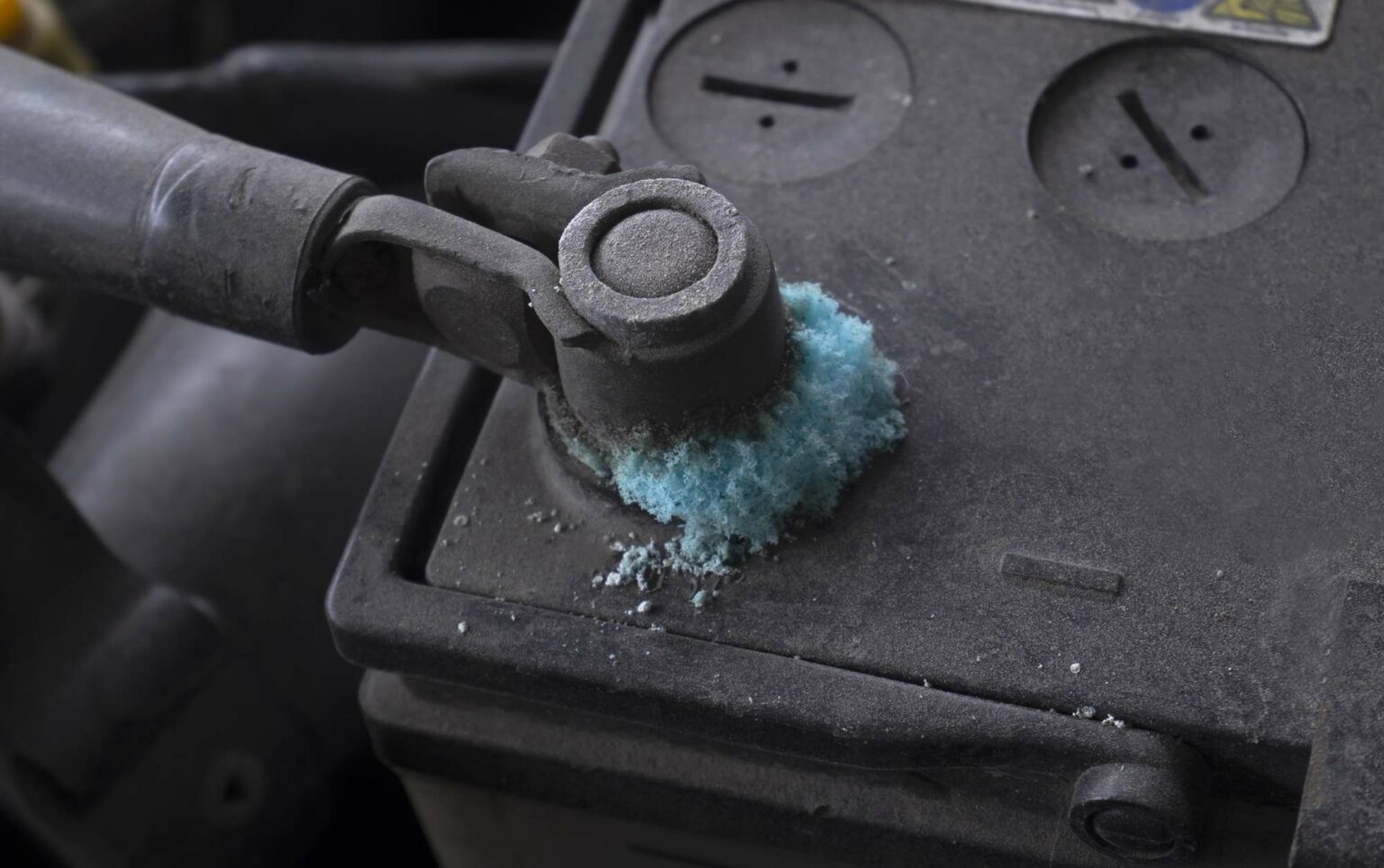 How do you clean car battery terminals?