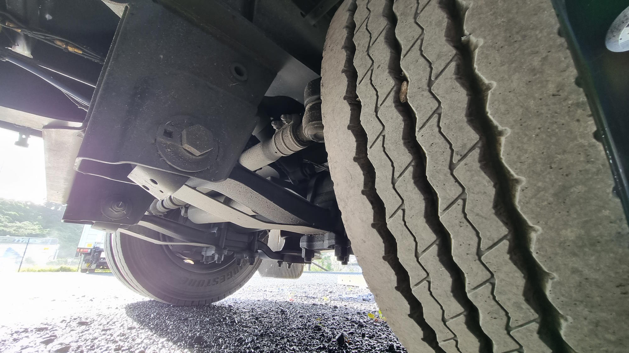 What are rearsteer axles and why are they used?